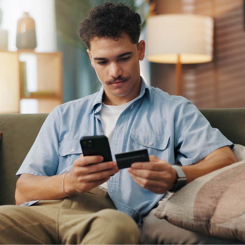 man with access to convenience paying for something on his phone