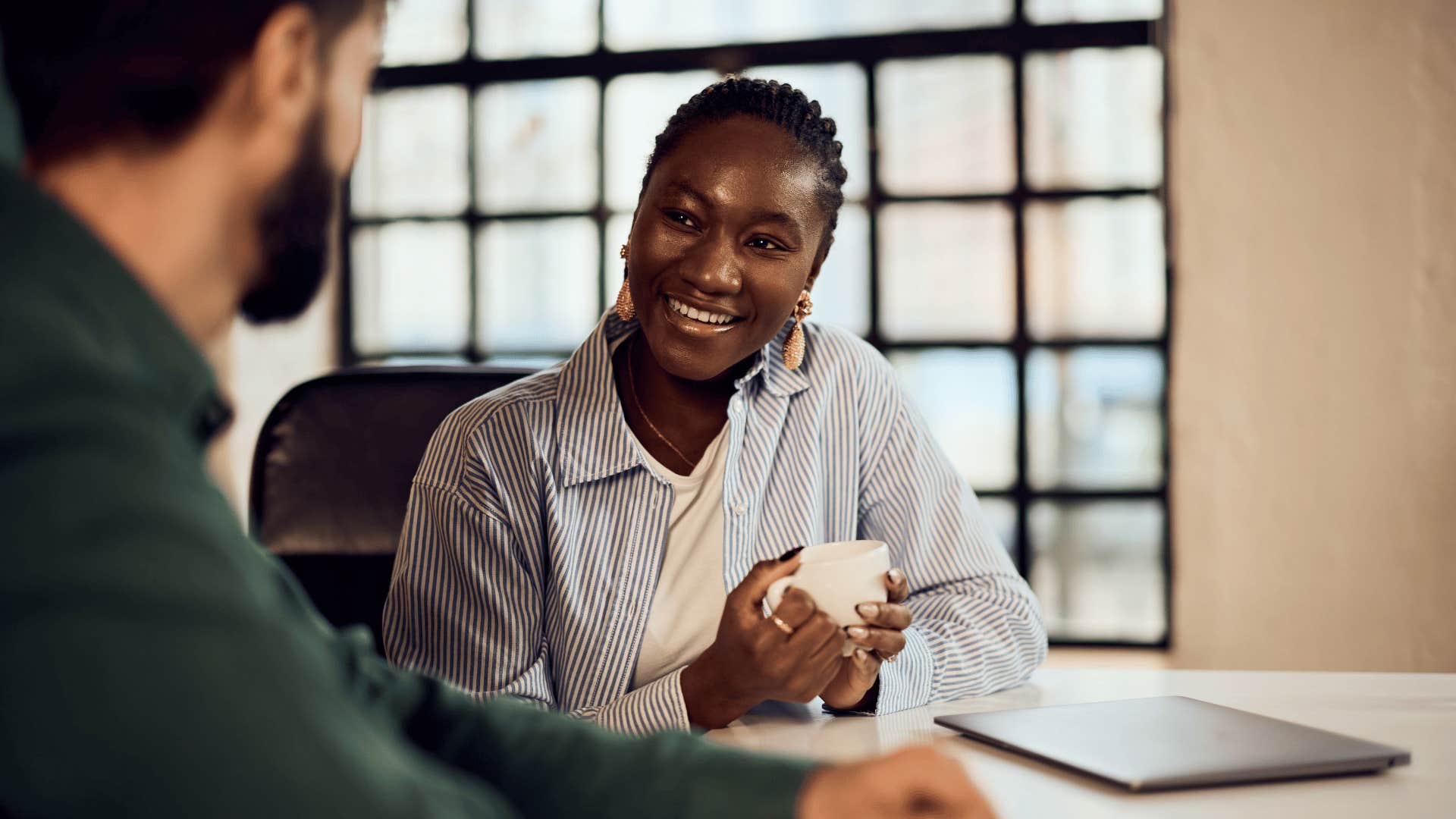 sarcastic woman talking to colleague joking you'll do