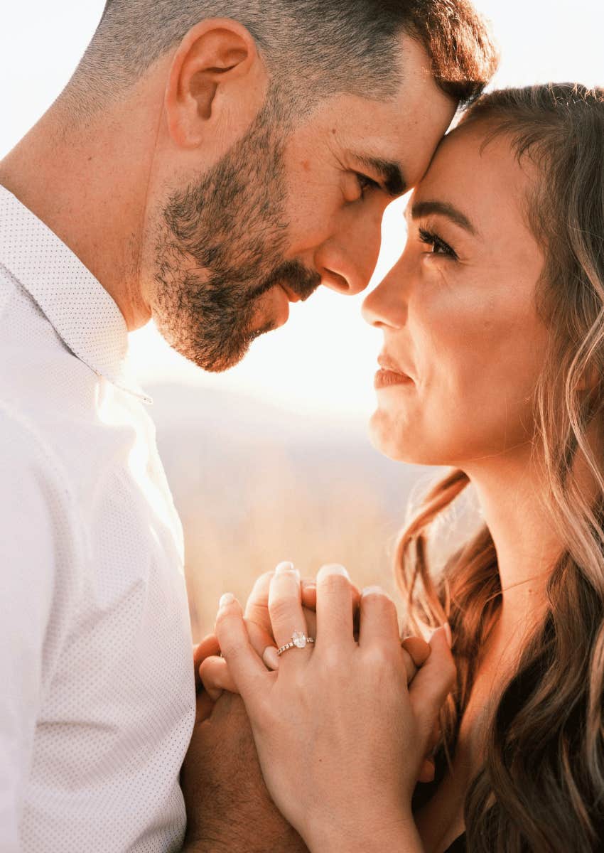 loving couple holding intense eye contact