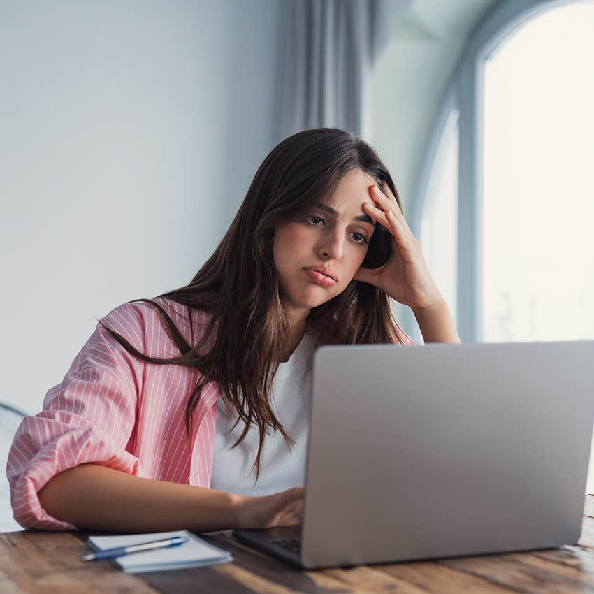 woman getting frustrated while working as complex issues arise