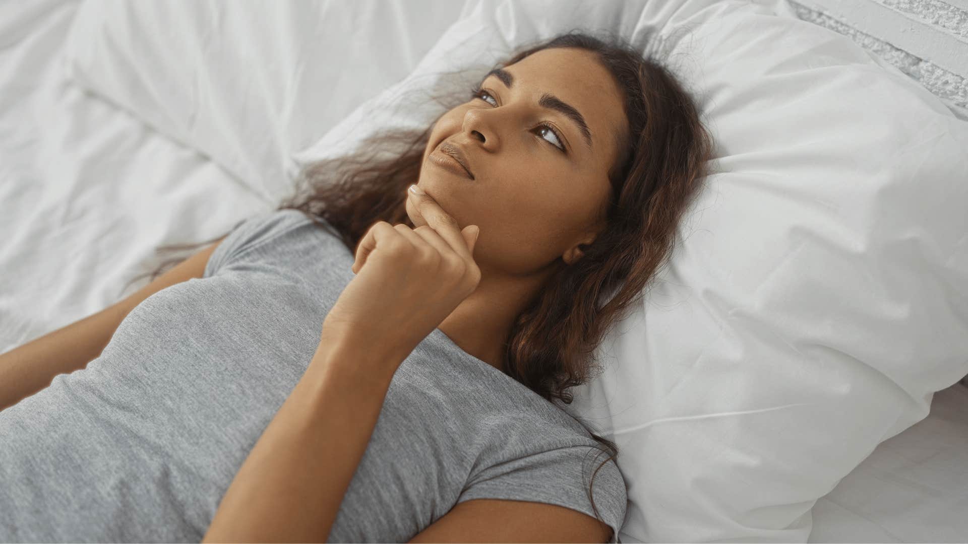 woman thinking deeply having deep philosophical conversation with herself