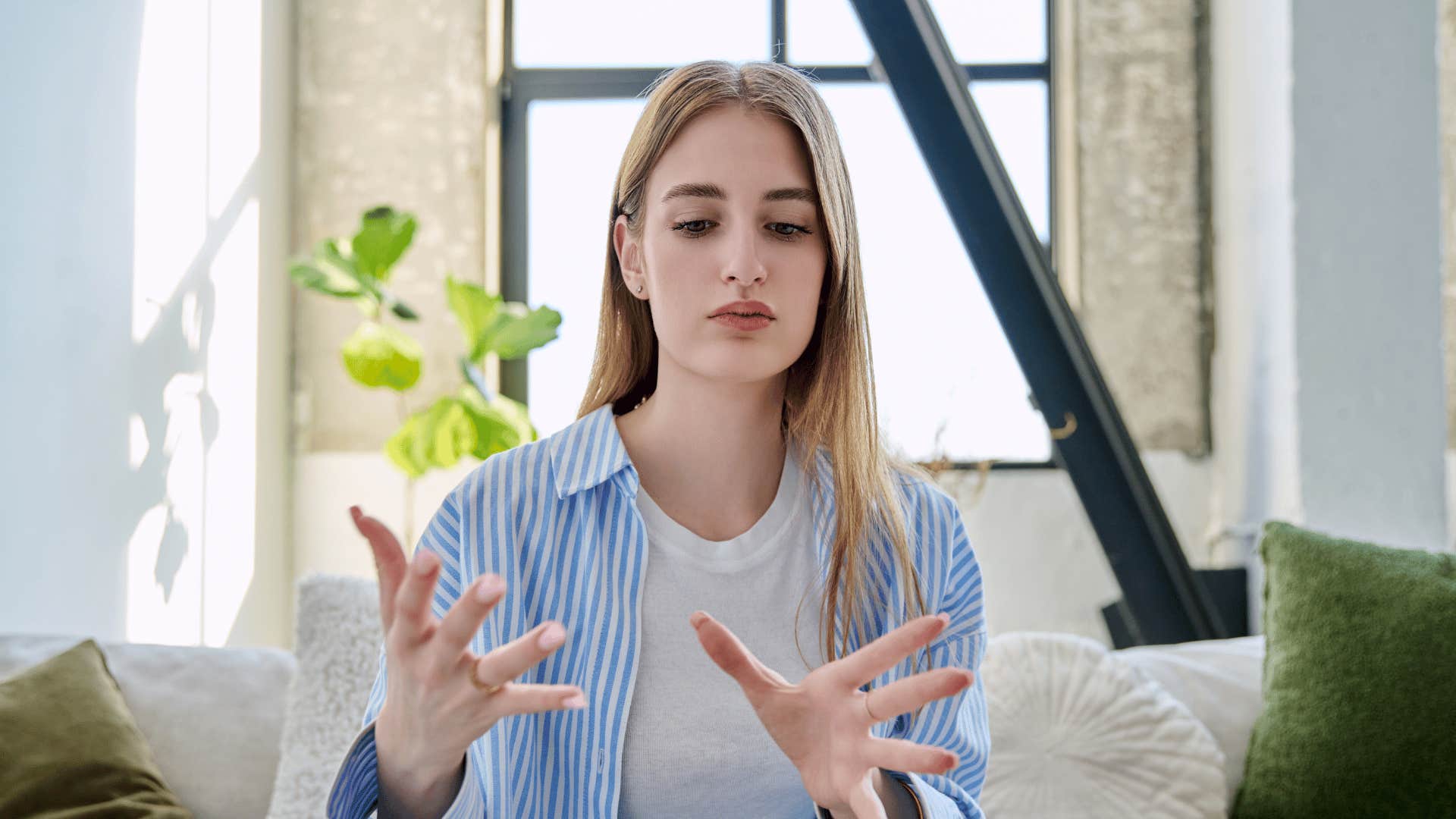 intelligent woman mentally debating herself for fun at home