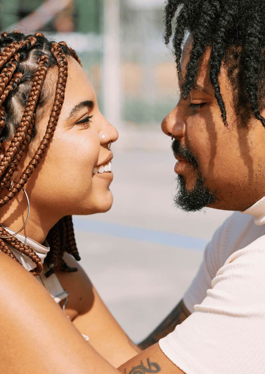 man and woman holding eye contact