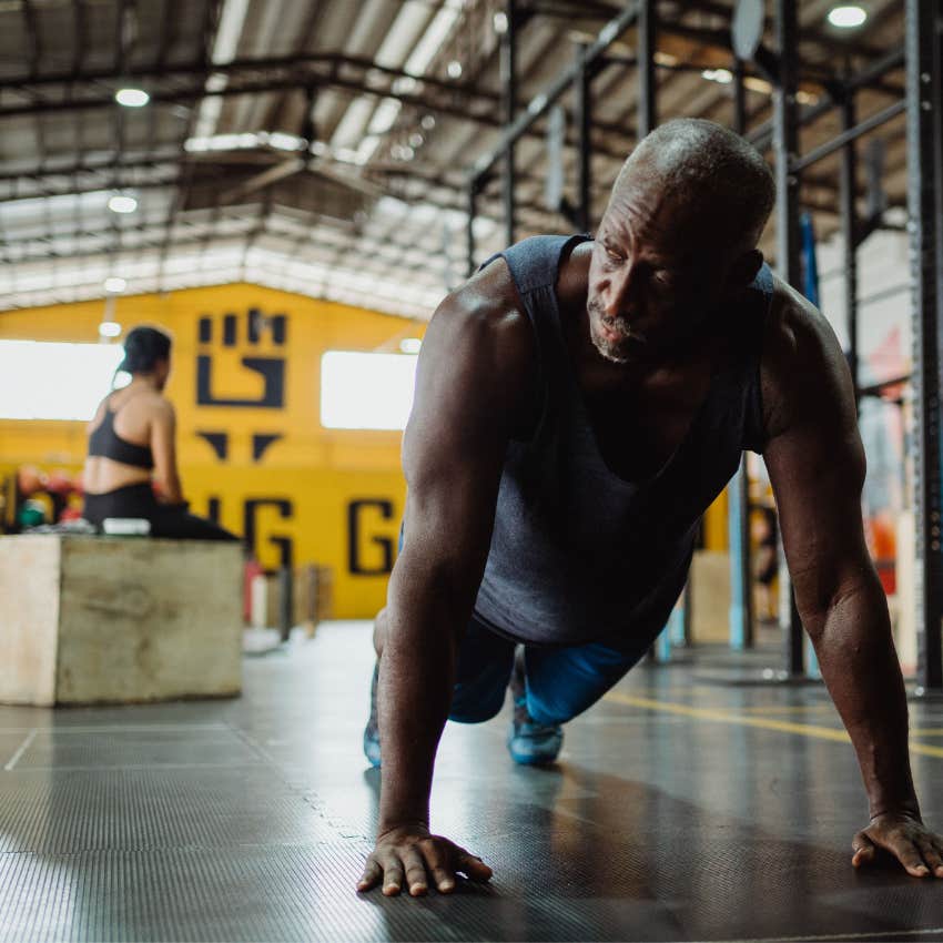 Determined man continuing toward his goals with confidence after feeling beat down
