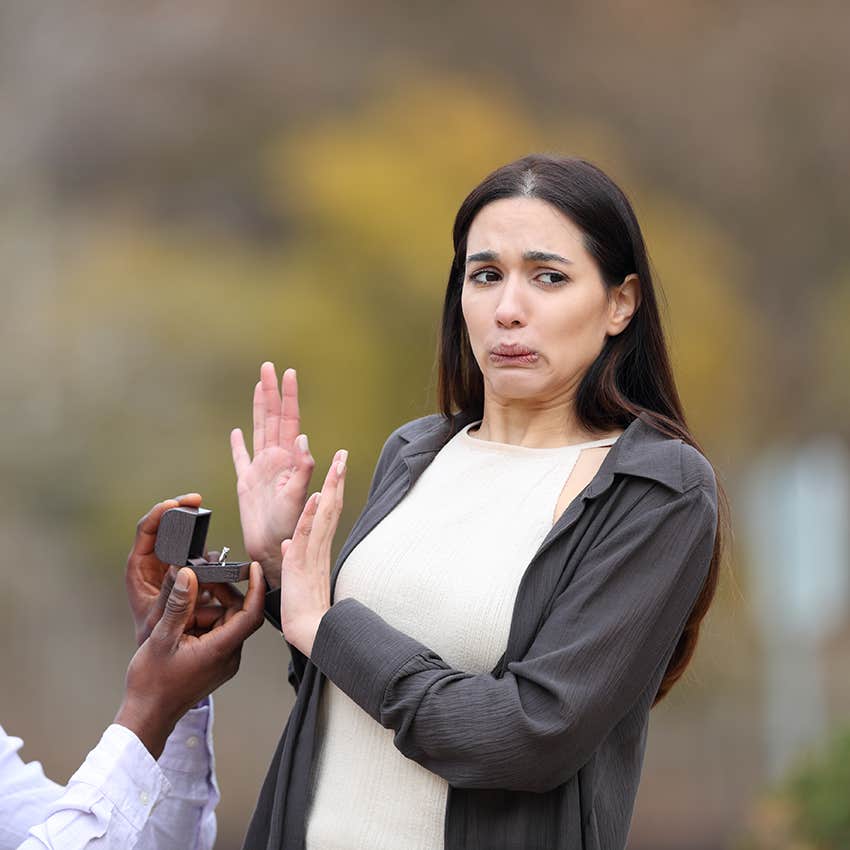 woman rejecting a public proposal