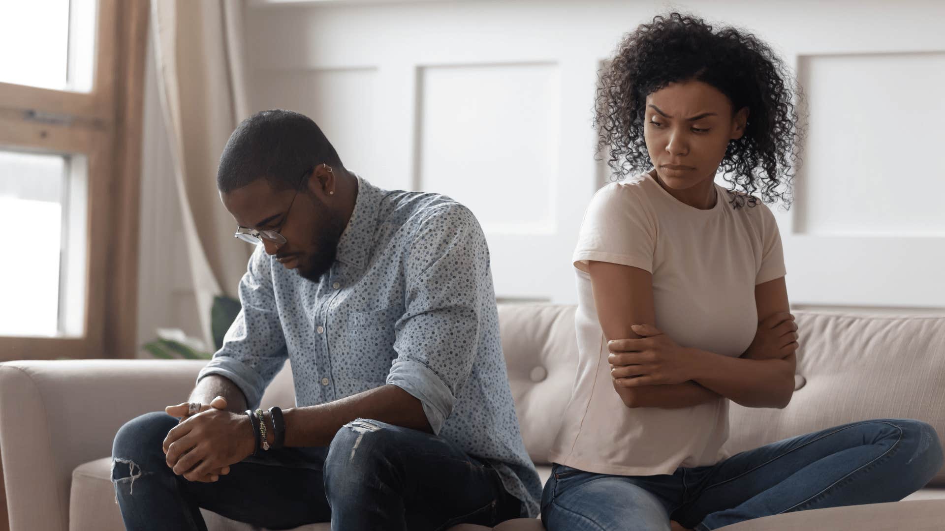 man having trouble apologizing to his wife