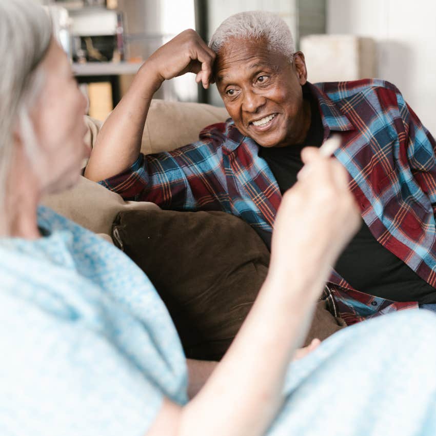 lying man assuring his wife saying i'm telling the truth