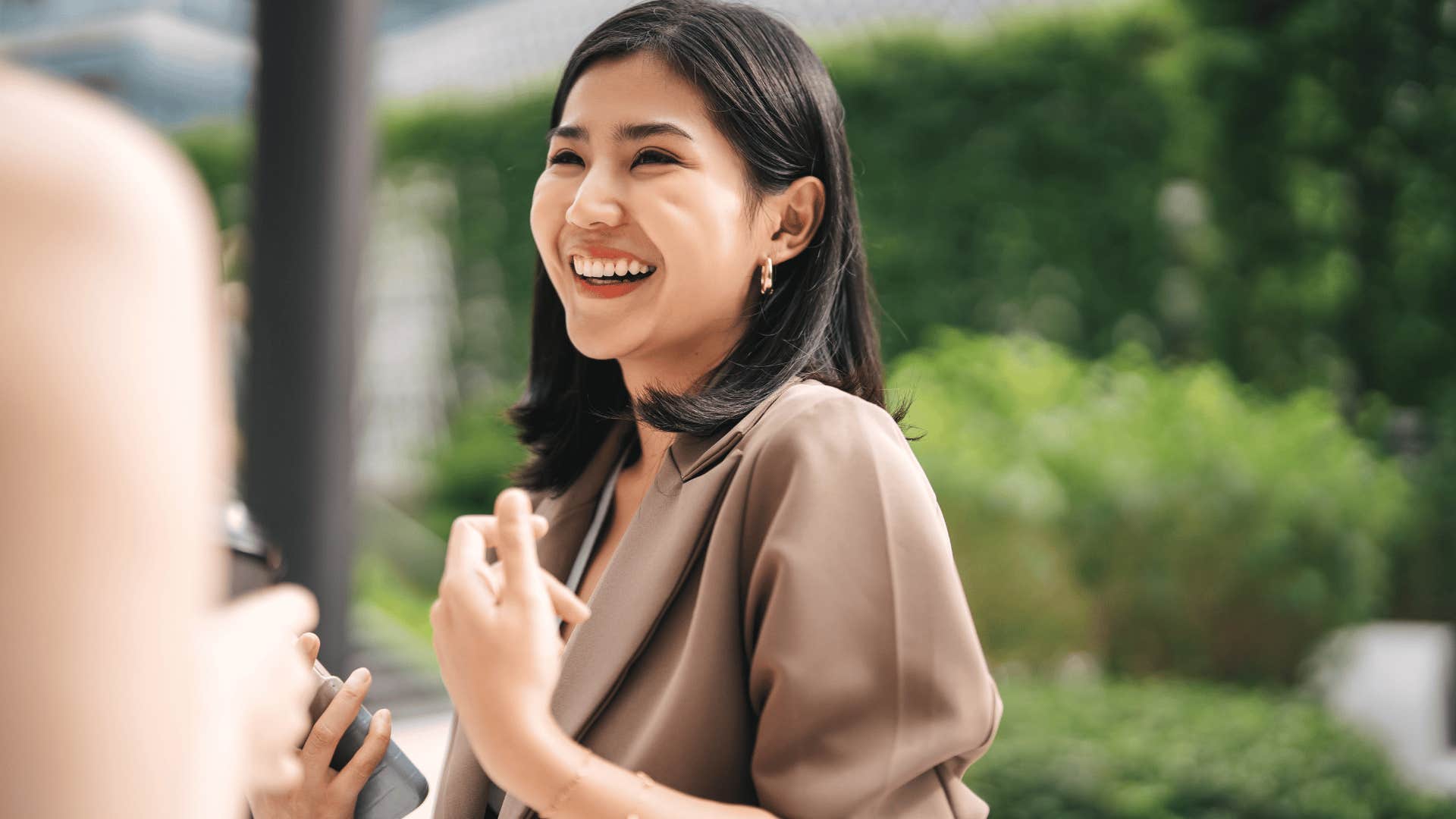 happy woman refusing to stay stagnant in life