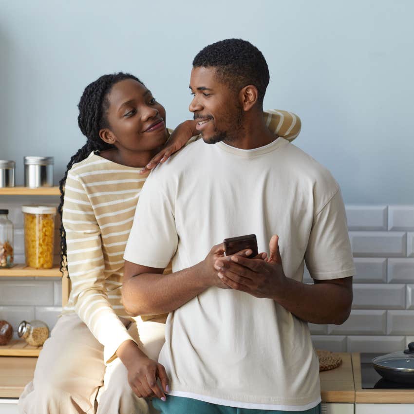 millennial man focusing on his girlfriend instead of his phone because he has limits with technology