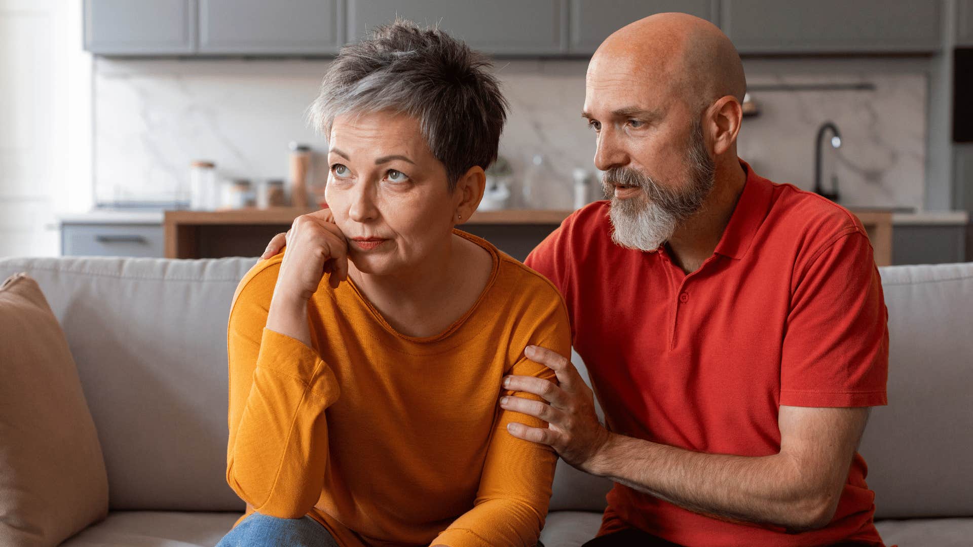 man trying to comfort narcissistic woman and give her attention
