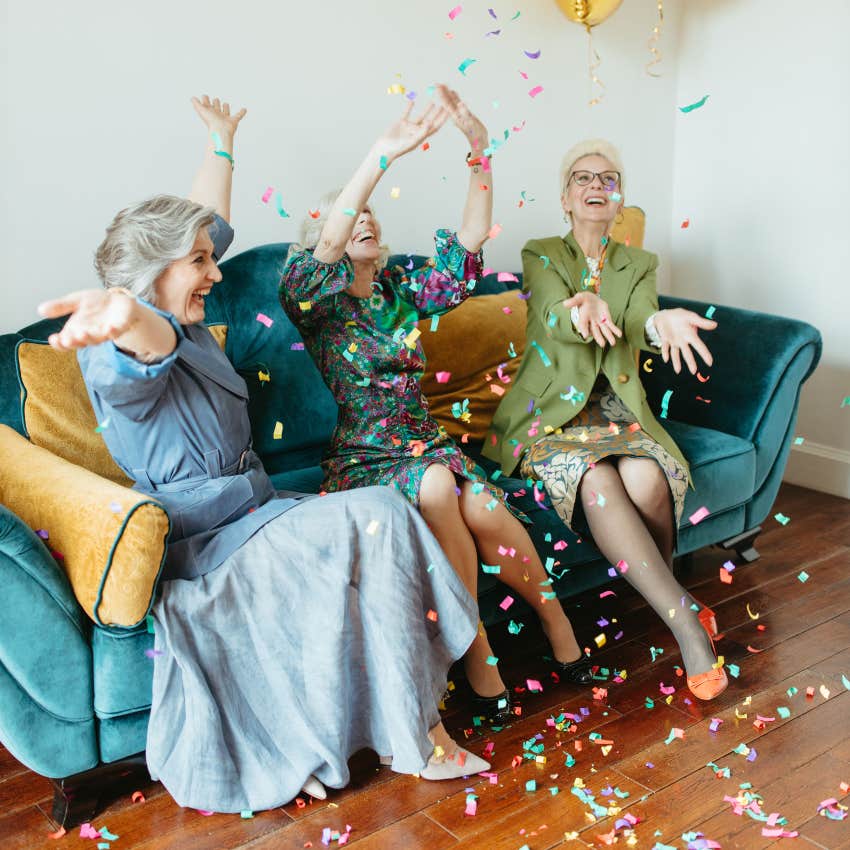 older women throwing a party