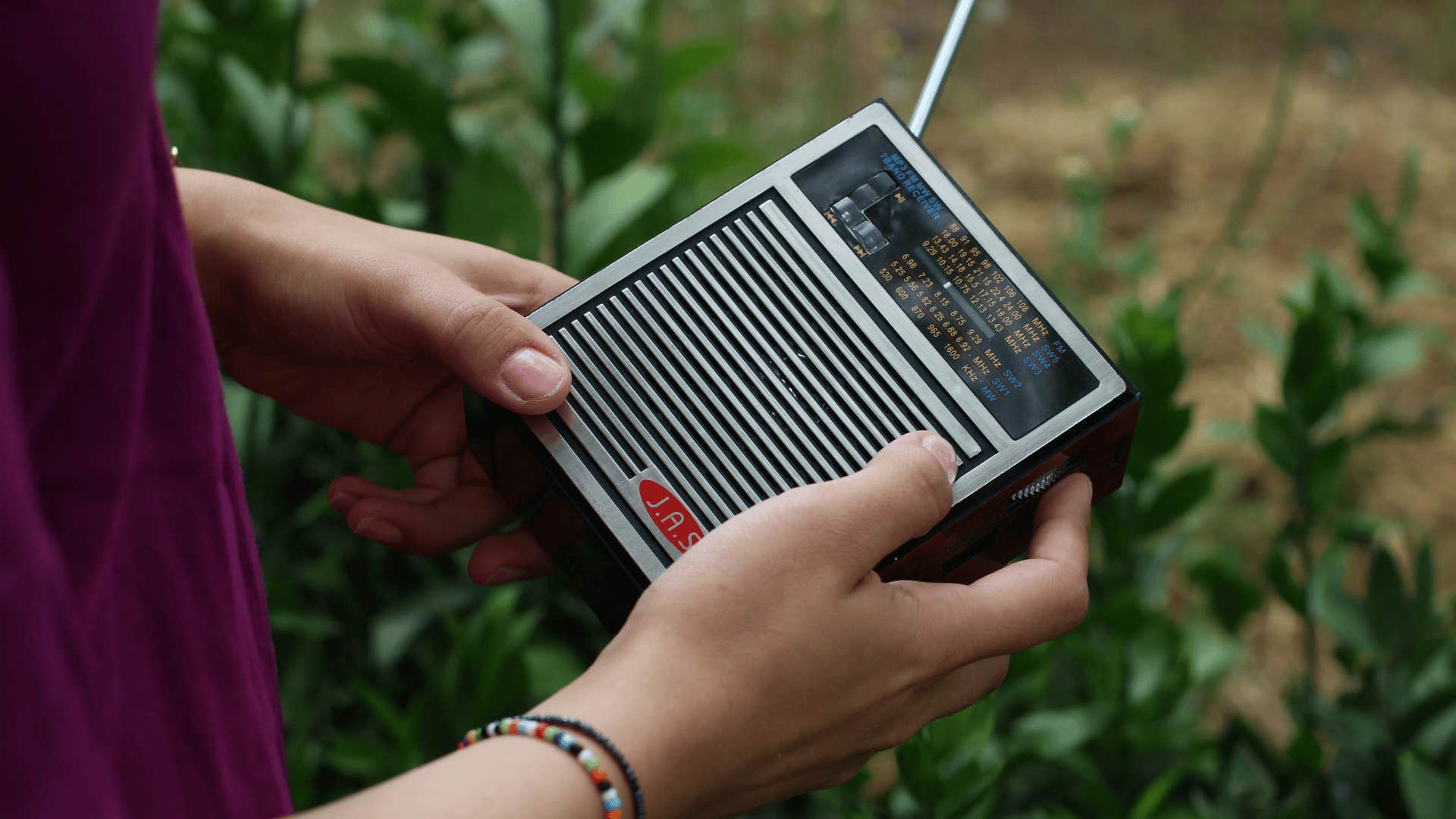 person in 1970s using a ham radio