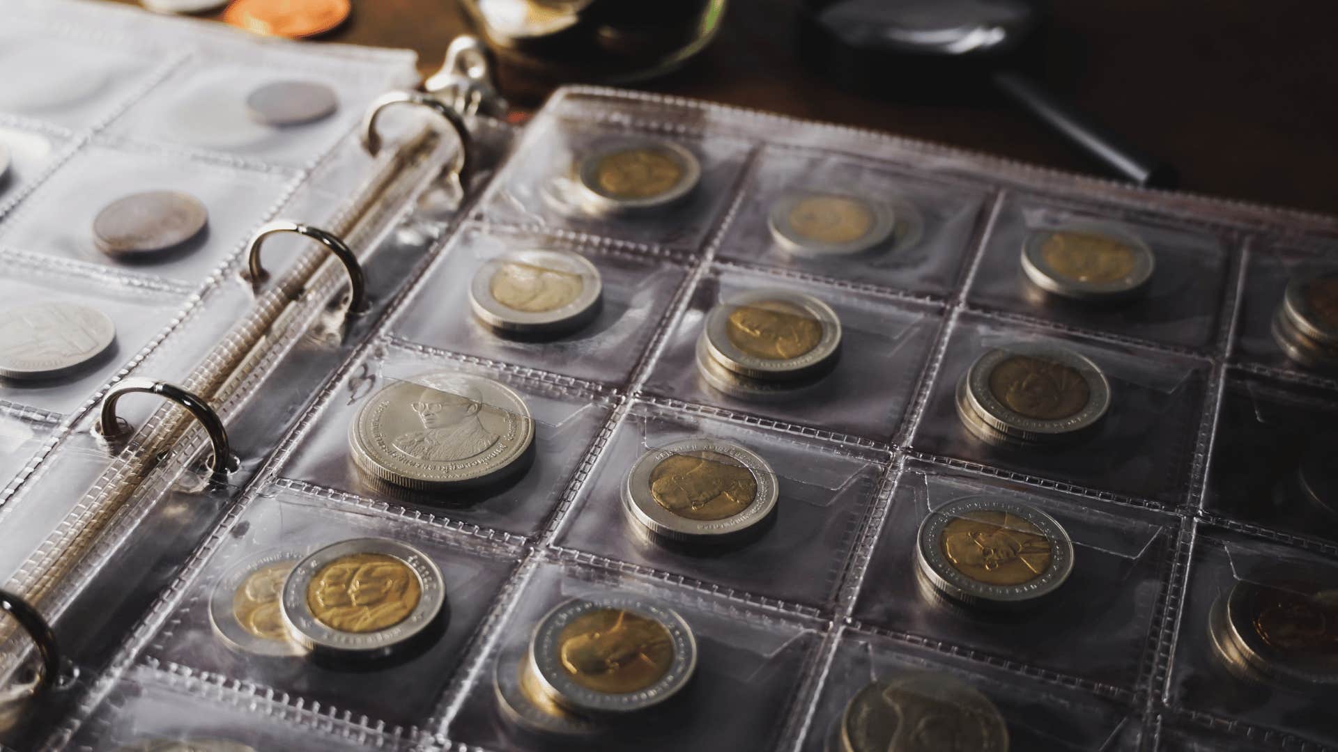 old fashioned coin collection in a binder