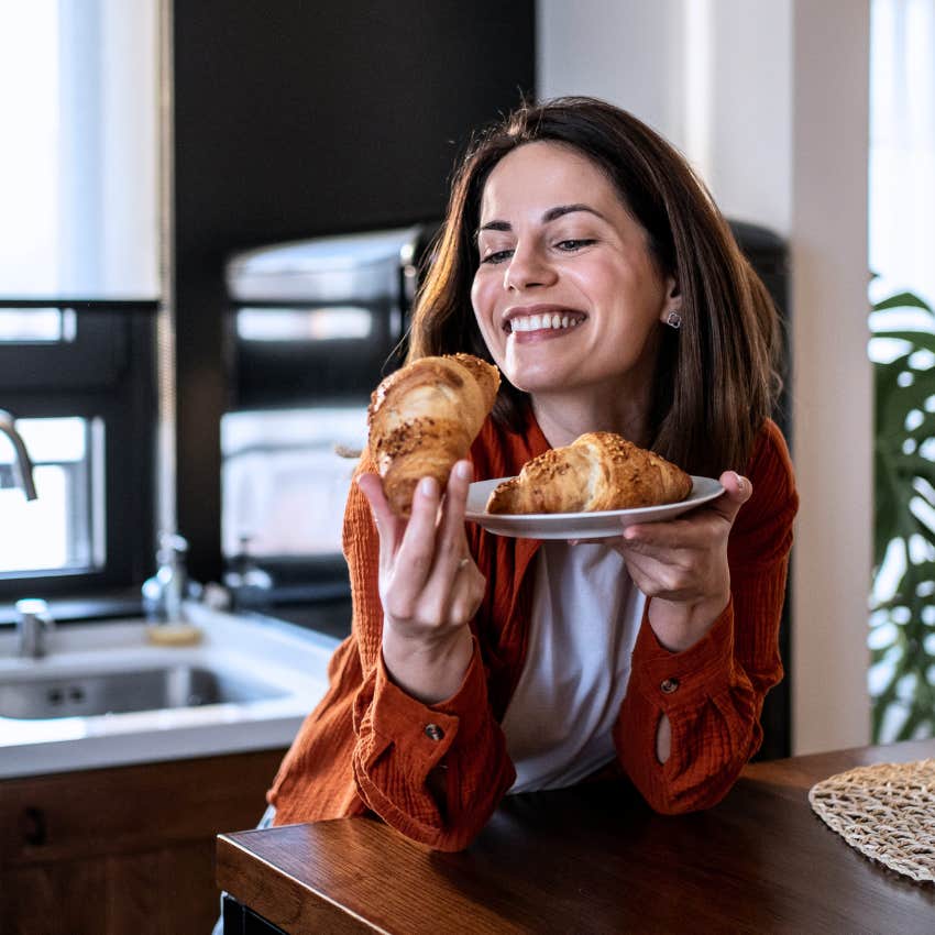 Woman baking and decorating cakes at home