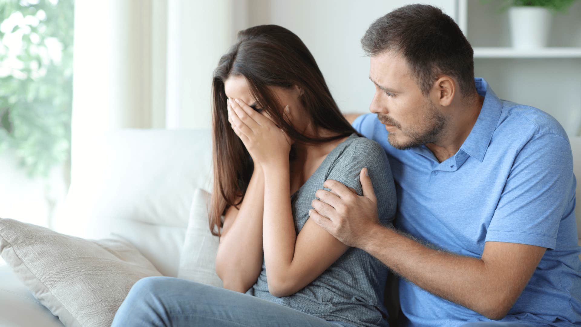 man comforting his wife using emotional strength and care