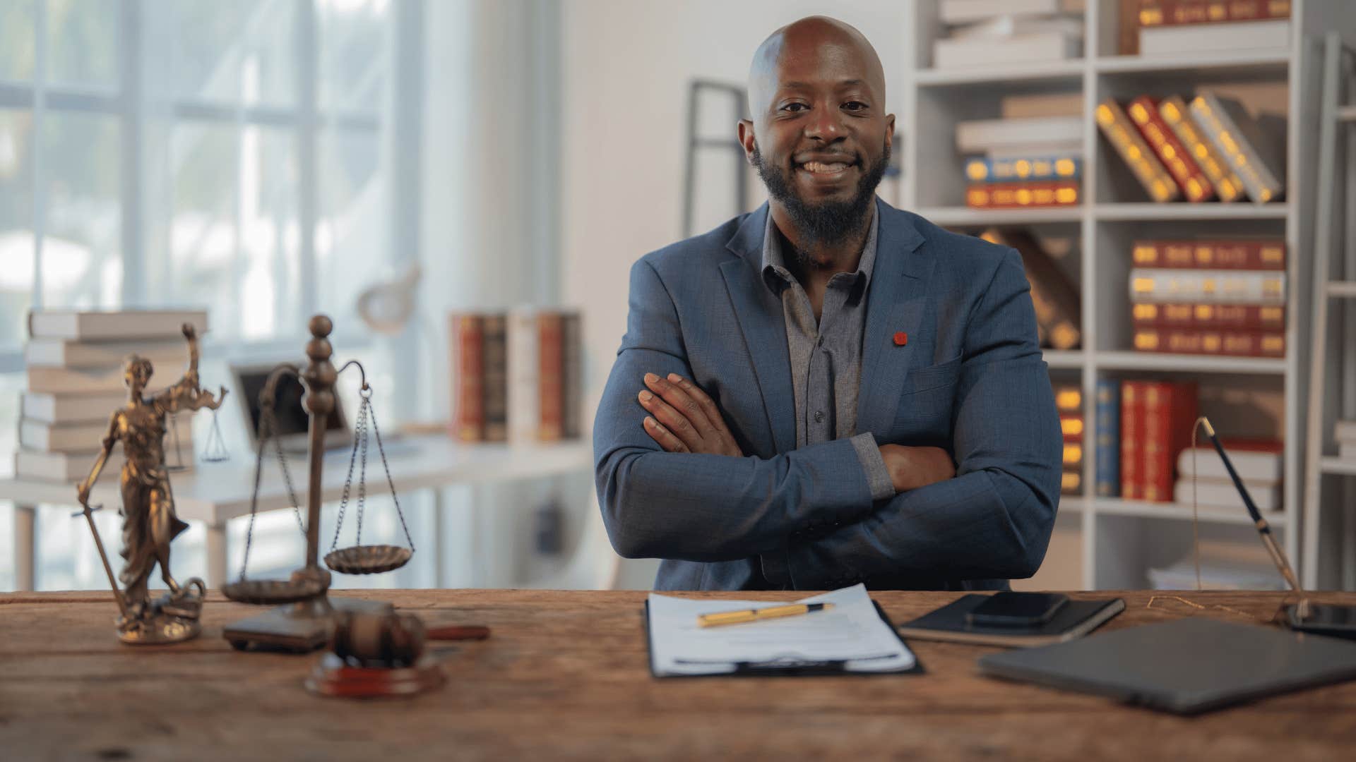strong man with integrity sitting at desk at work