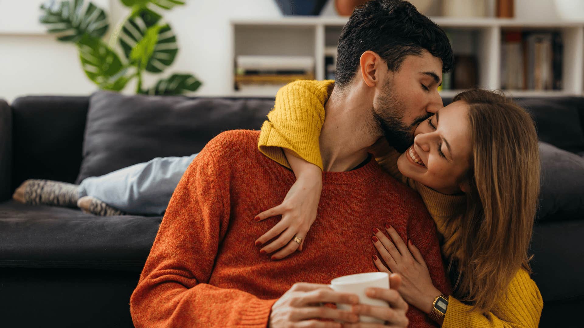 man kissing wife's cheek keeping his promises