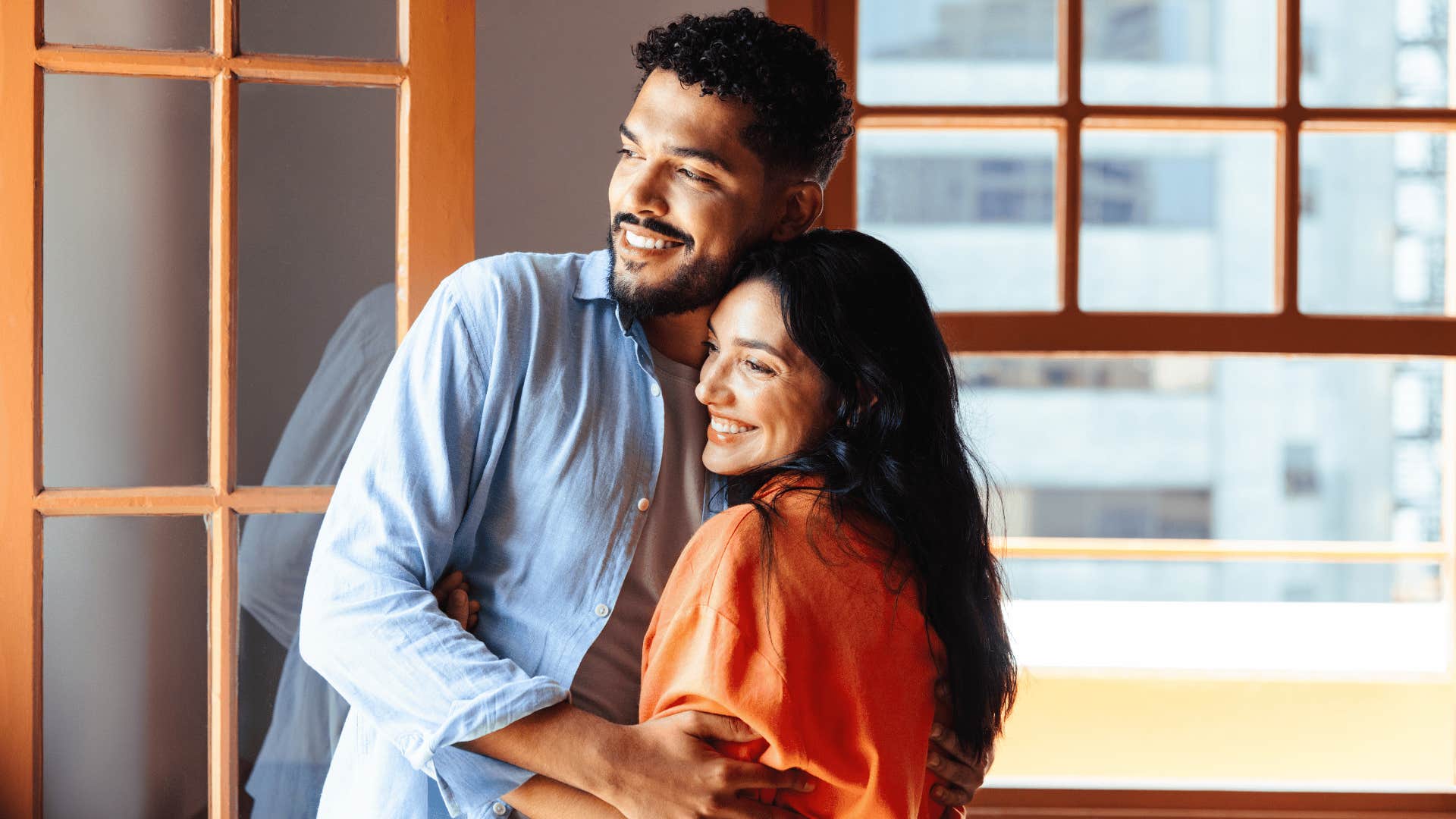 couple in healthy relationship looking outside together