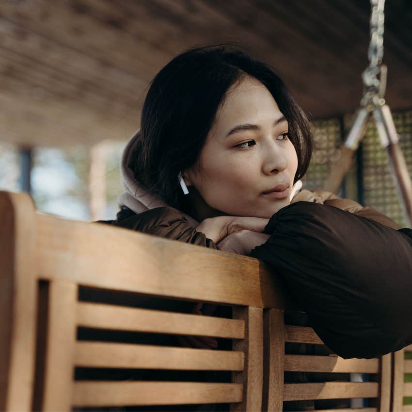 young woman reflecting alone enjoying a peaceful moment
