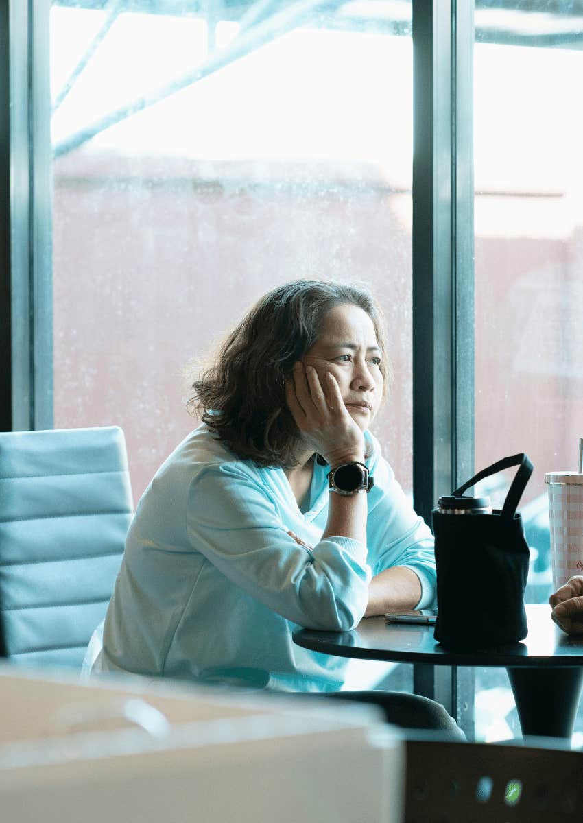 older employee taking her break