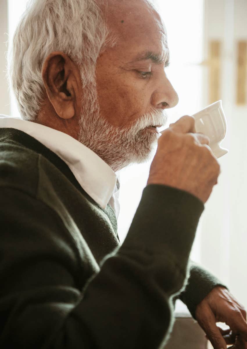 older man drinking a cup of tea