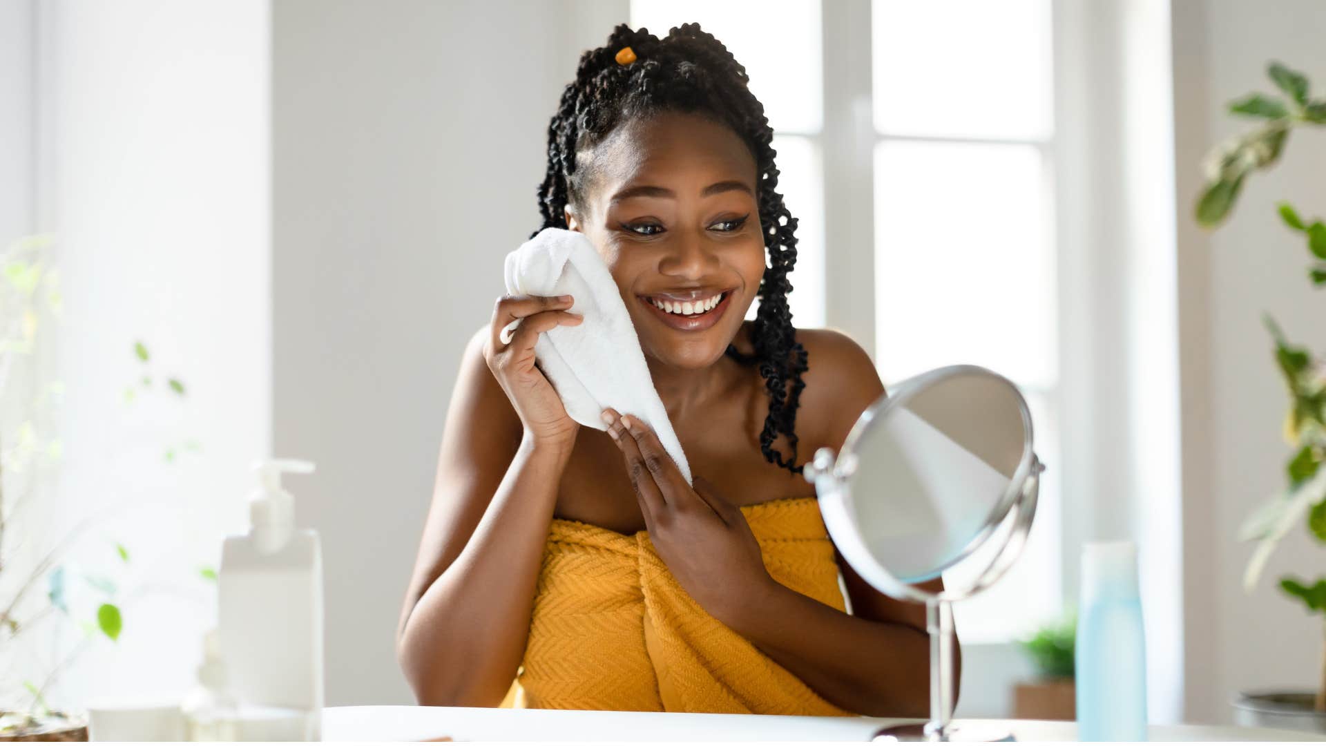 millennial woman doing her skincare routine