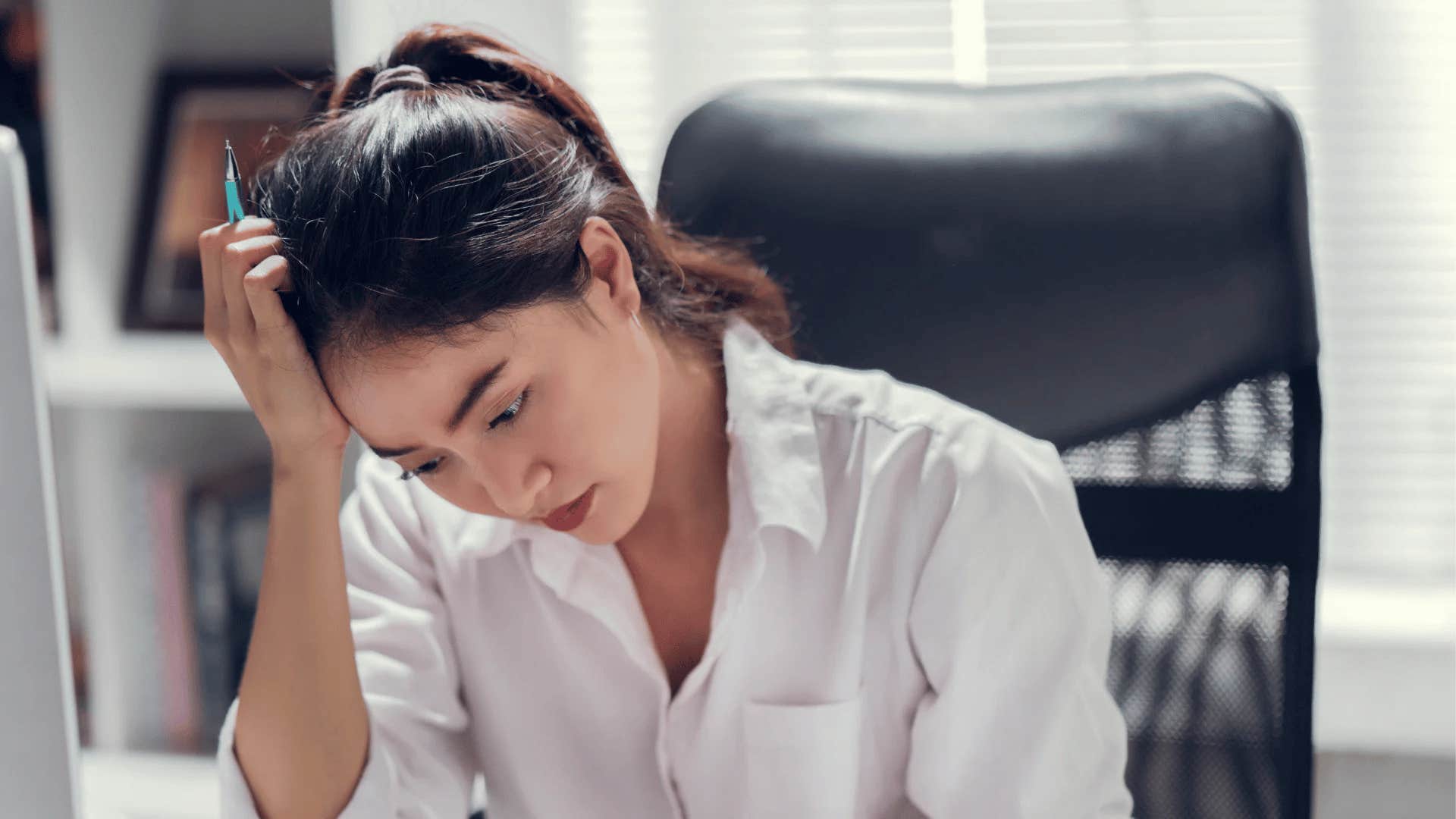 woman who passive-aggressively turns in late assignments because she secretly hates her job