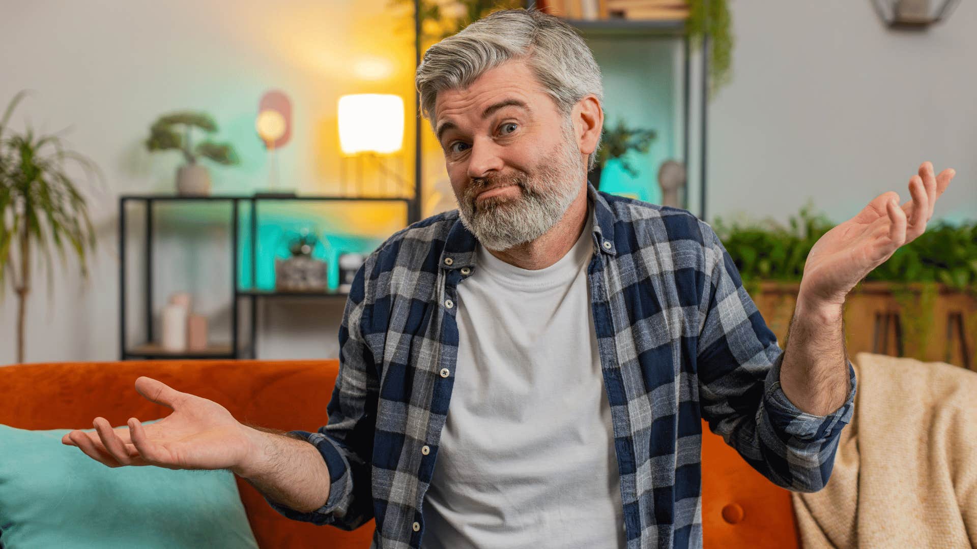 man shrugging lacking empathy for others