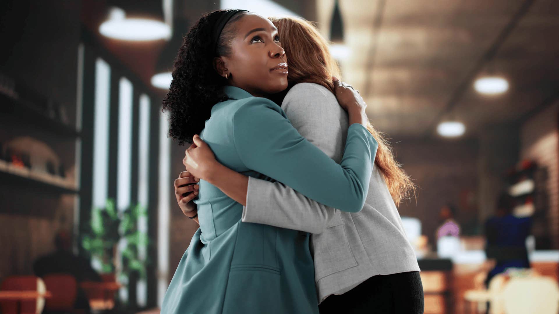 woman with bad character reluctantly hugging friend because it's convenient
