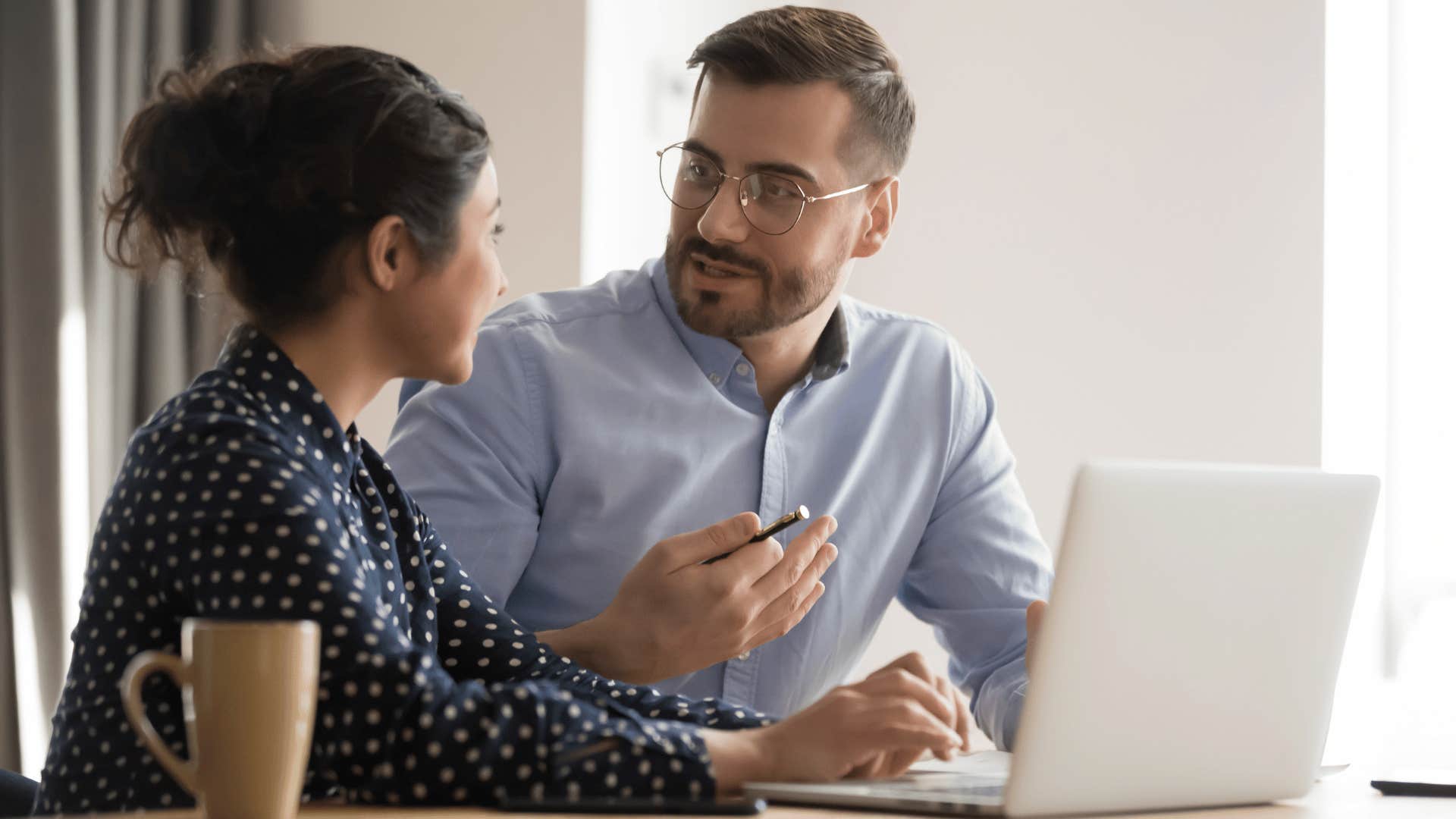 classy intelligent man telling coworker that's a fair point