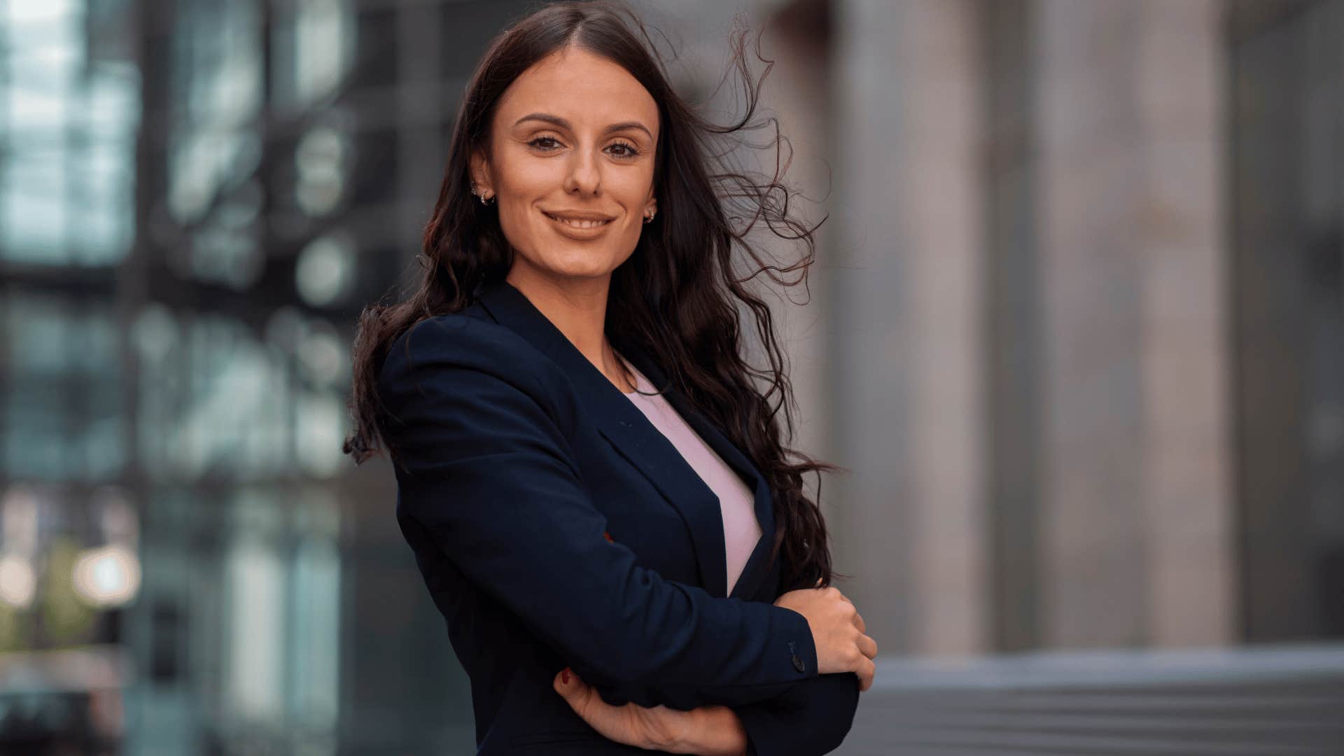 independent professional woman crossing her arms