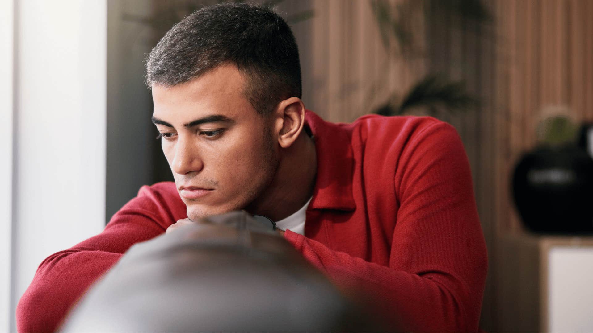 man moping at home saying i knew this would happen