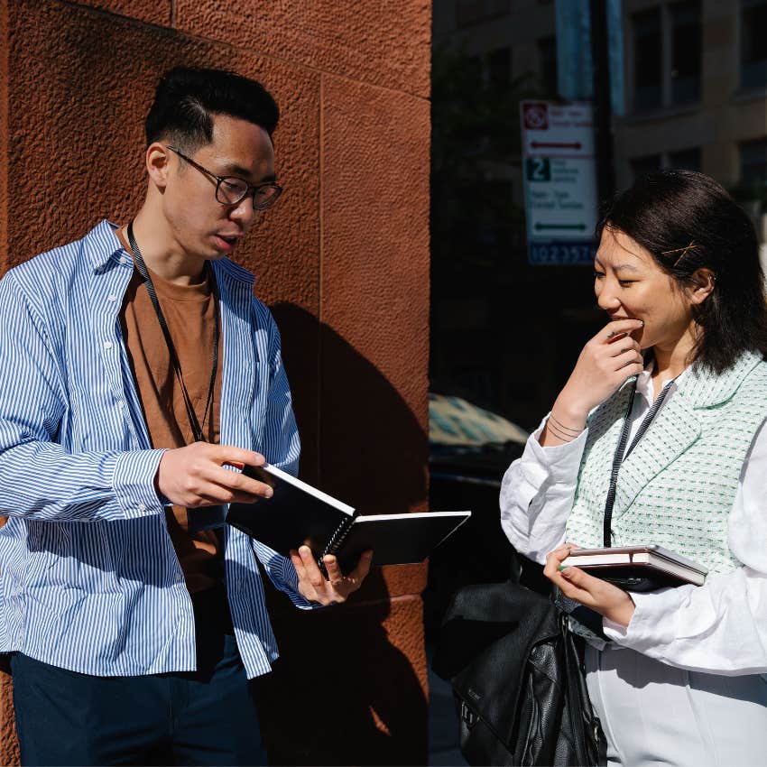 Two people engaged in a conversation while one listens attentively and asks thoughtful questions