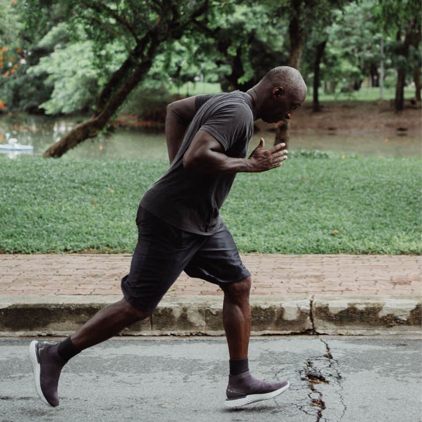 Man running after falling to keep going