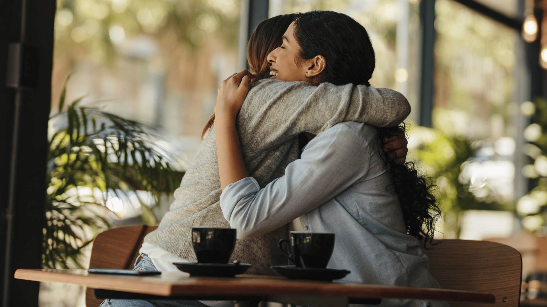 two friends valuing a real connection hugging 