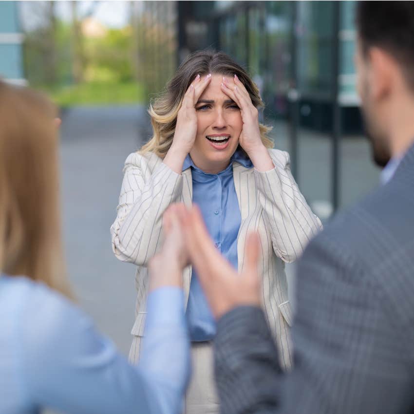 woman with a victim mentality telling colleagues stop attacking me