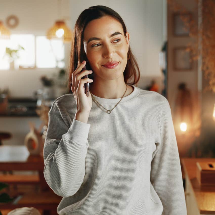 woman answering the phone not getting caught by surprise