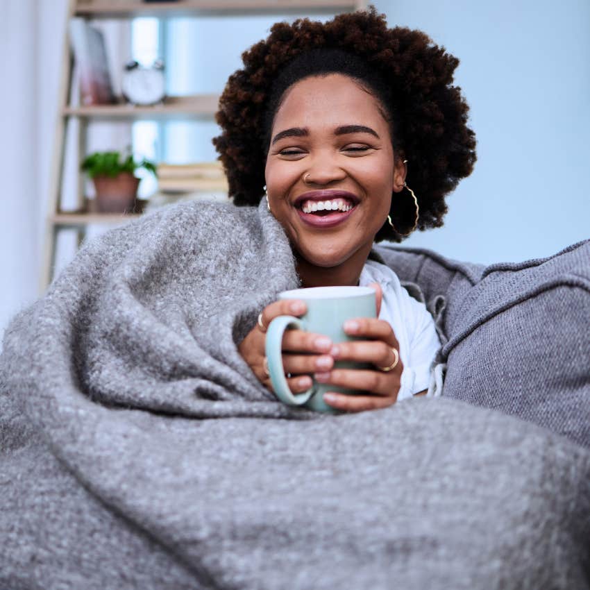 relaxed woman who's less distracted with her phone notifications off