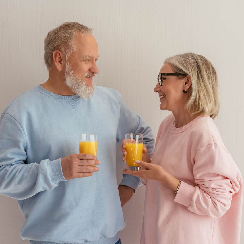couple drinking orange juice