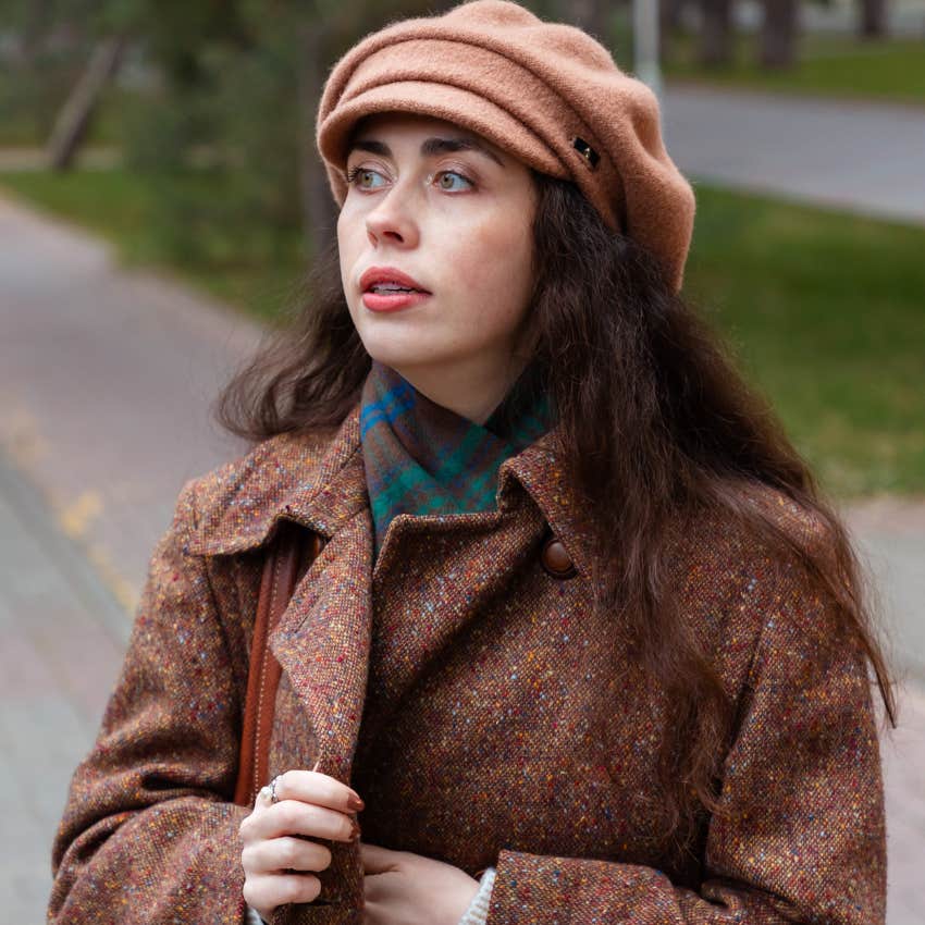 woman who is different from everyone else leaving the house without distractions to walk outside