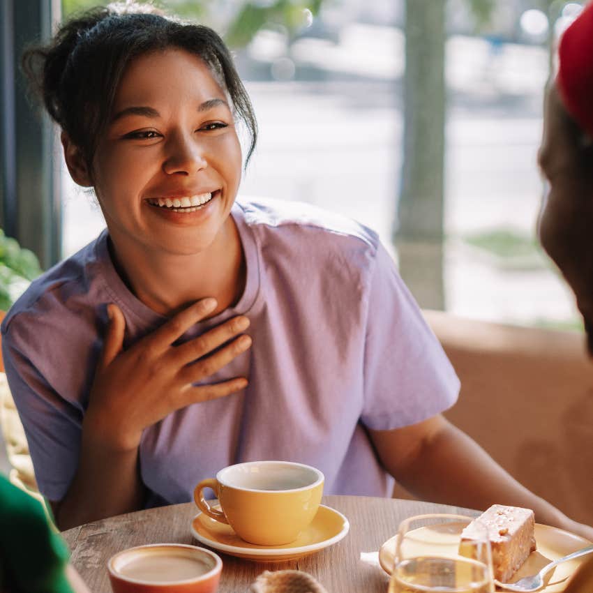 extremely vibrant woman wearing confidence in contagious ways in conversation