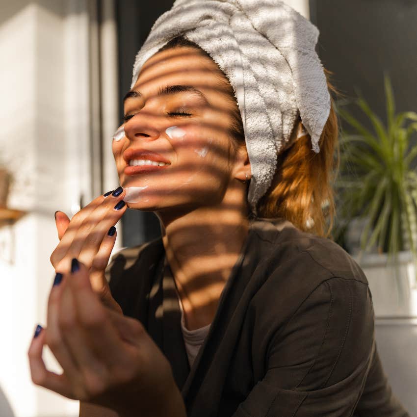woman practicing self care in her beauty routine