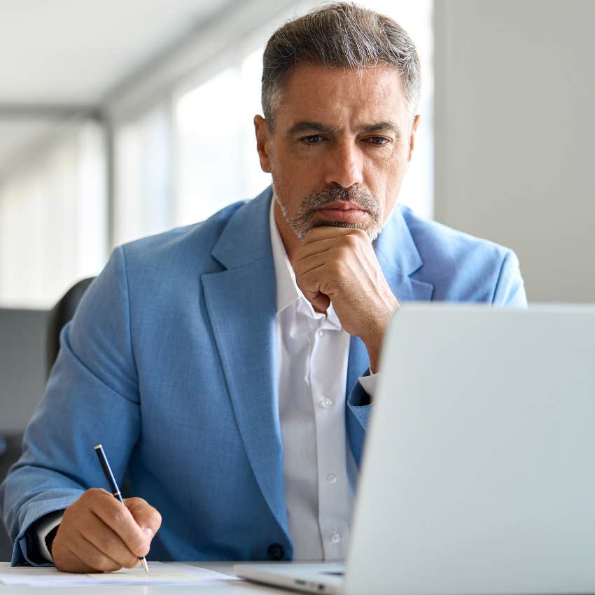 older man who grew up without technology solving problems at work