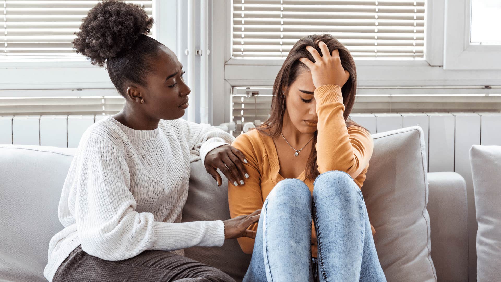 intuitive woman picking up on tiny changes in energy comforting friend