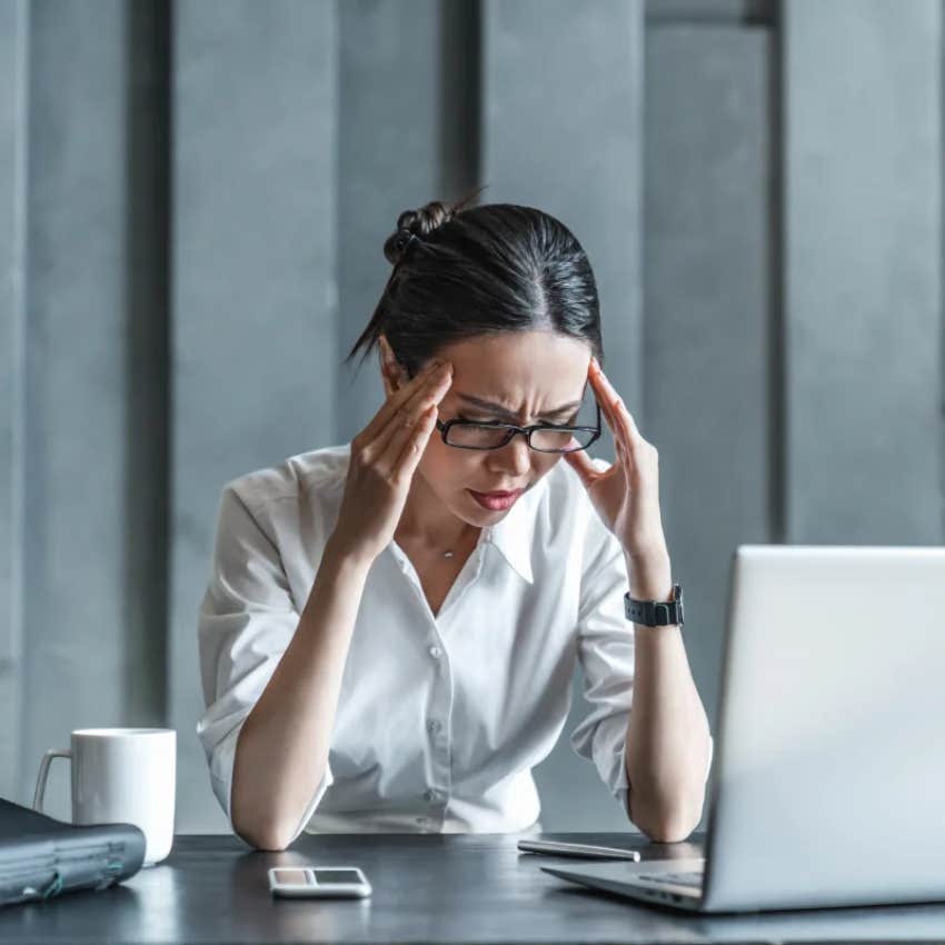 sensitive woman feeling stressed at work