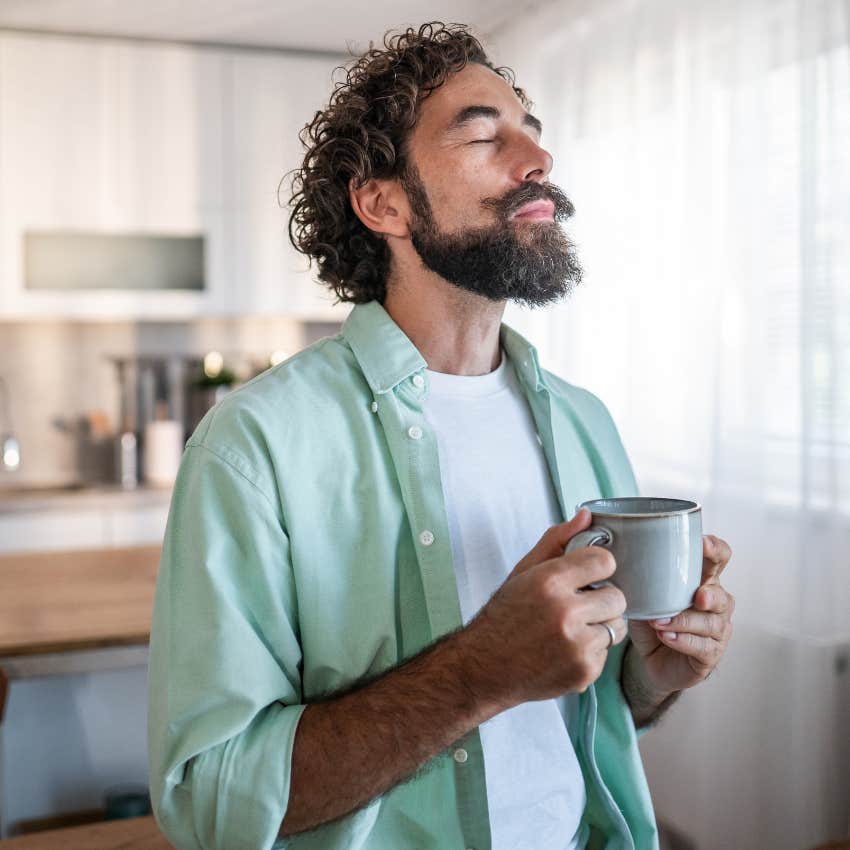 Man sitting in silence at home.