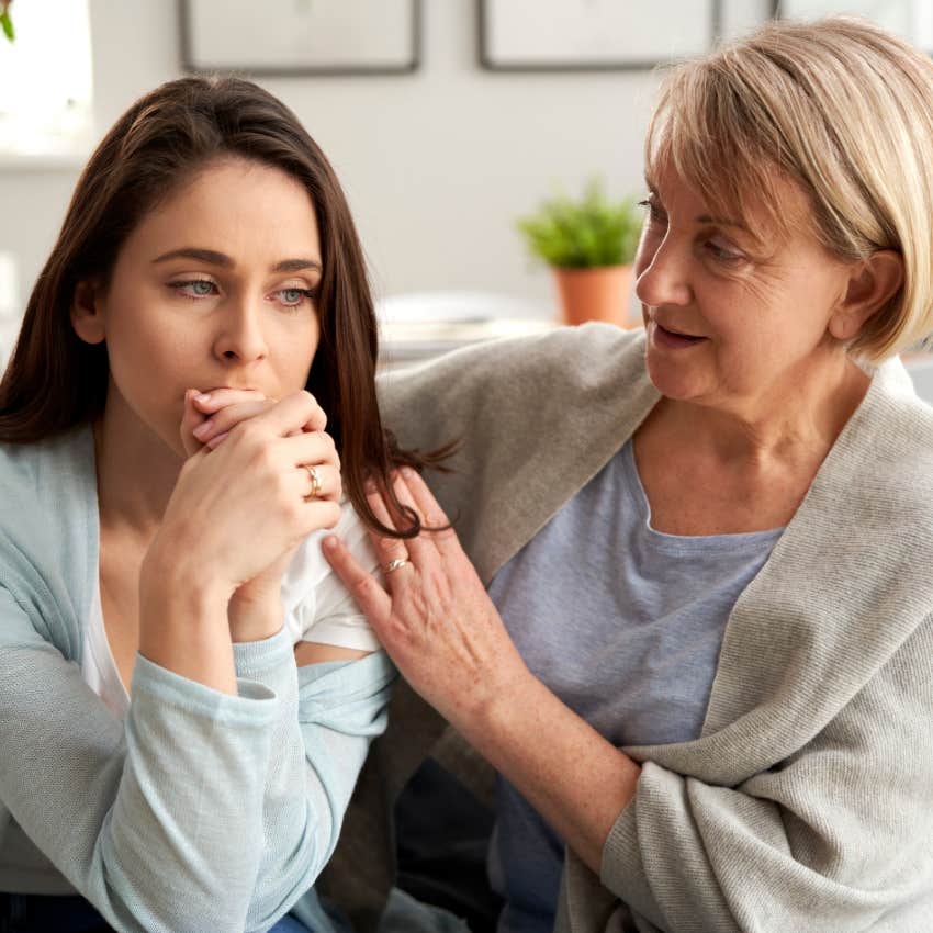 fake nice mom pretending to comfort her daughter