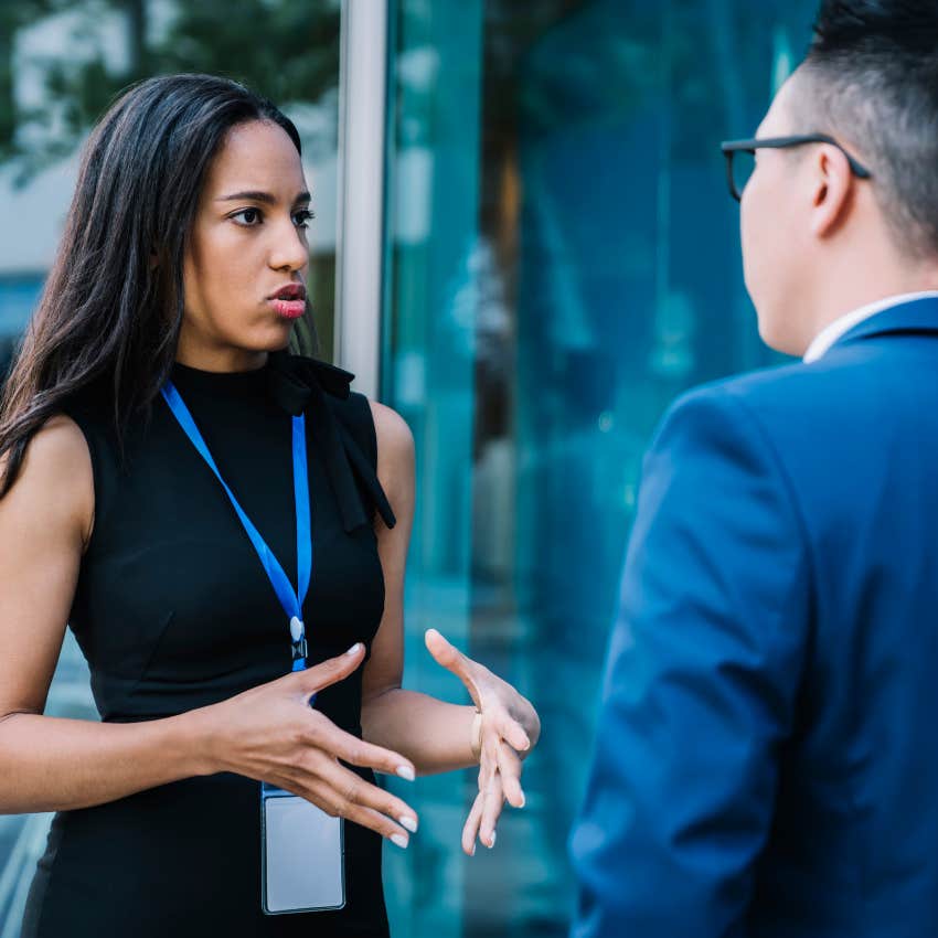 fake nice woman talking to colleague saying i'm trying to be honest