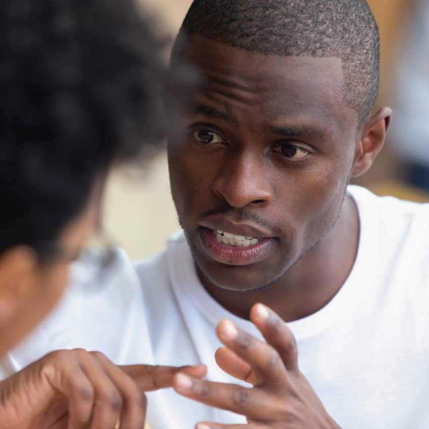 authentic and intuitive man talking to friend pointing out things he's noticed
