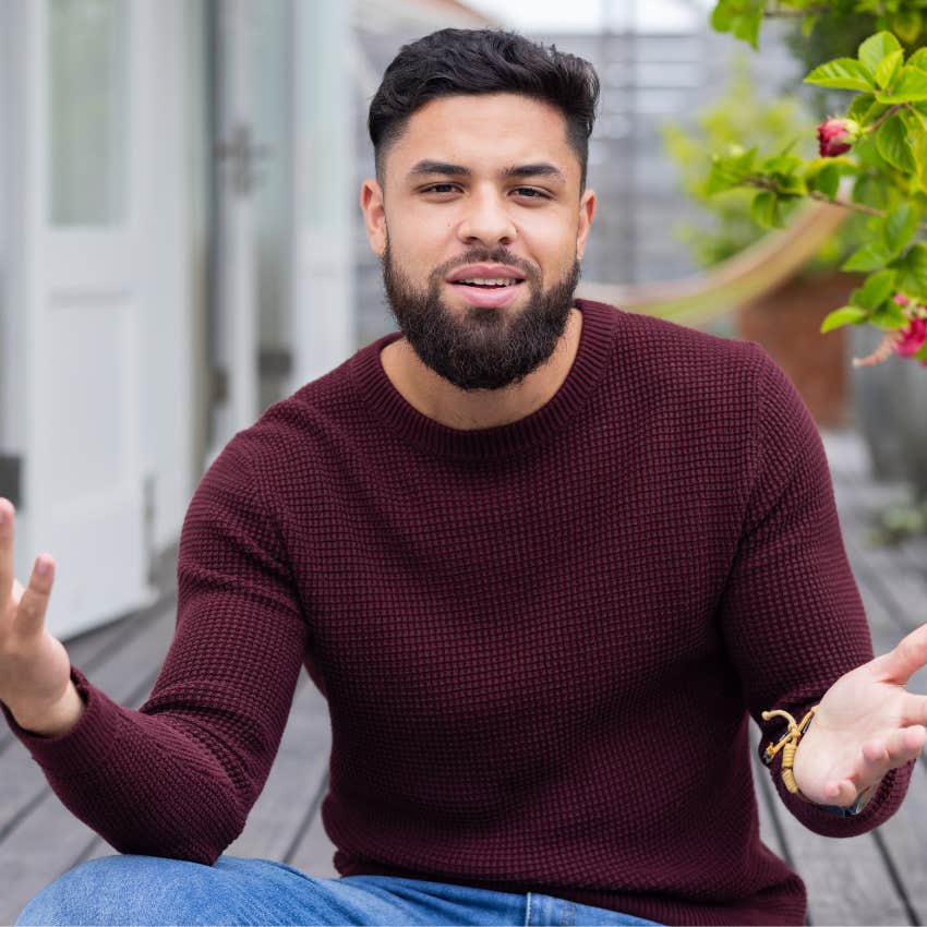 man in conversation canceling plans saying he doesn't want to get anyone sick